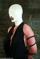 Venus in a latex hood exposed for punishment and sex